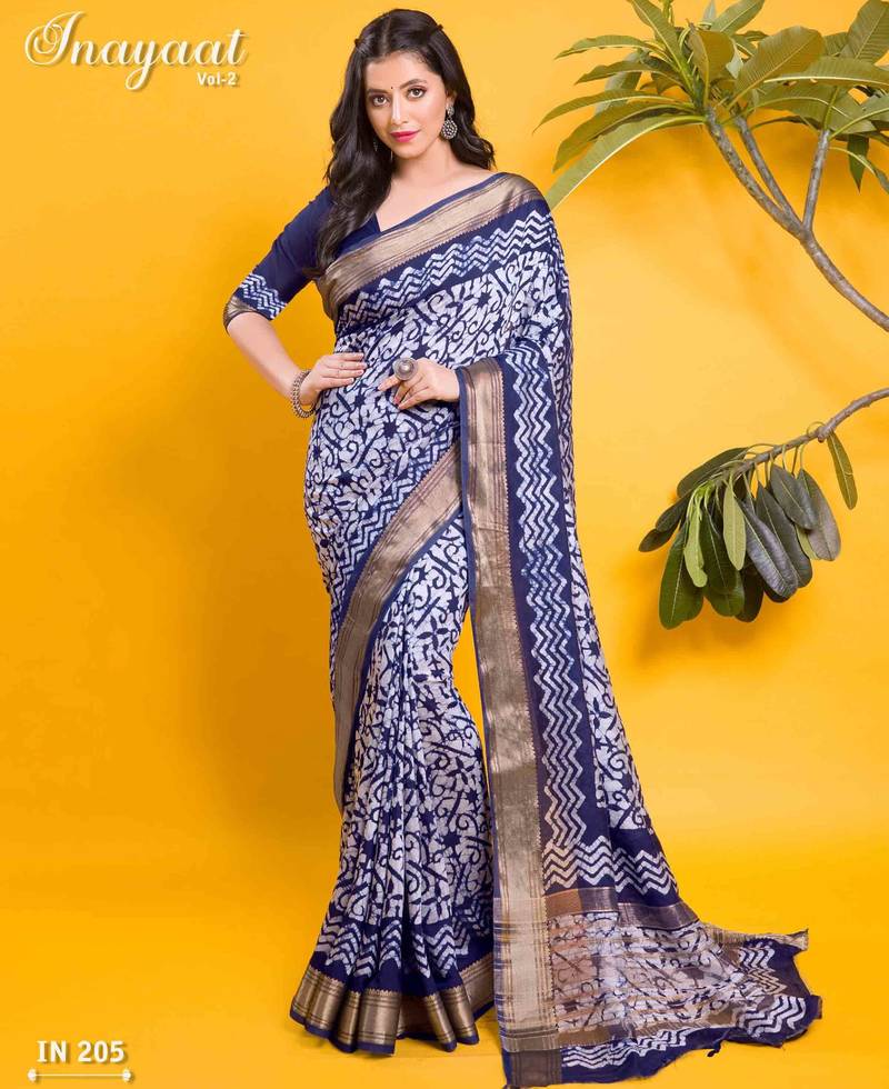 Navy blue floral batik saree with antique zari border