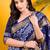 Navy blue floral batik saree with antique zari border