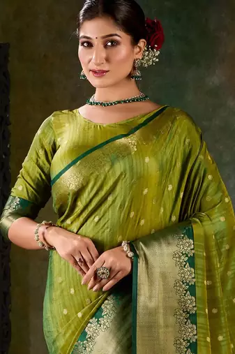 Olive green banarasi silk saree with emerald zari border