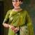 Olive green banarasi silk saree with emerald zari border