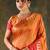 Sunset orange banarasi silk saree with coral red zari border