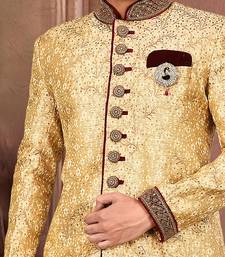 Gold straight pattern work on zari jamewar fabric with handwork