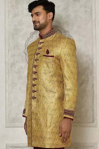Gold straight pattern work on zari jamewar fabric with handwork