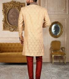 Gold straight pattern work on zari jamewar fabric with handwork