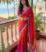 Orange Color embroidery sequence border and tussels Chinon Saree