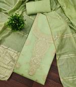 Elegant light green woven zari unstitched salwar suit with dupatta