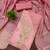 Elegant pink woven zari unstitched salwar suit with dupatta