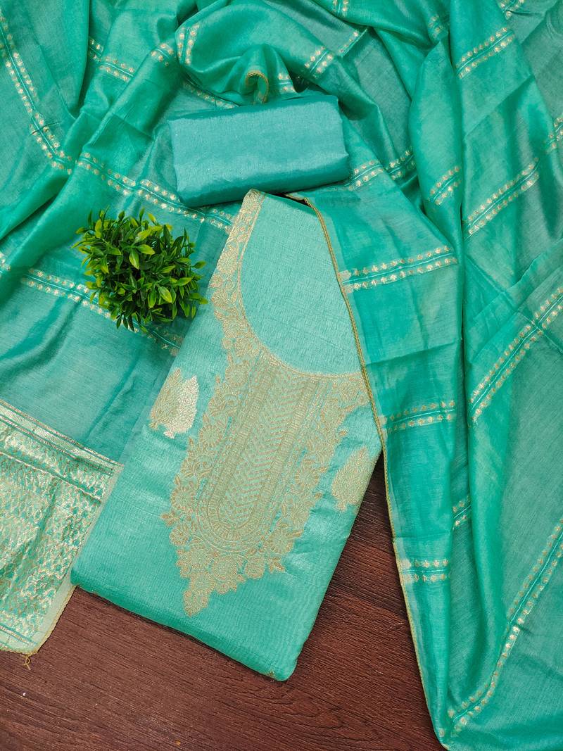 Elegant green zari woven unstitched salwar suit with dupatta