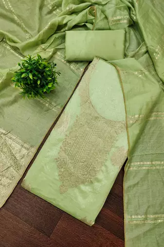 Elegant light green zari woven unstitched salwar suit with dupatta