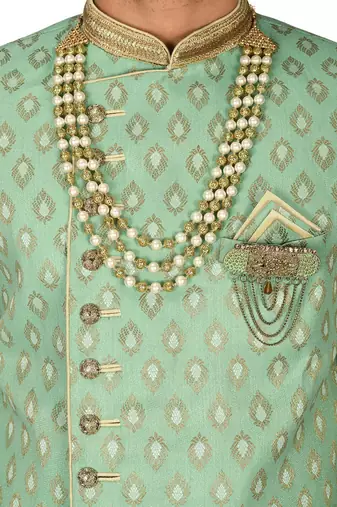 Green anghrakha pattern work with fawn pipe in indo western
