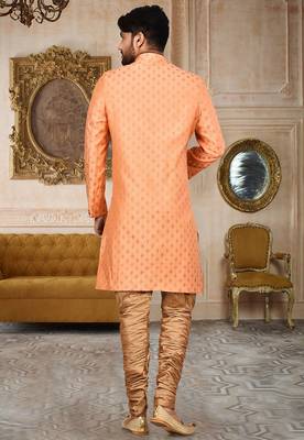 Orange  anghrakha pattern work with mahroon pipe in indo western 3