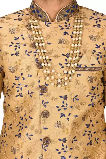 Light beige dupion arts silk anghrakha design with hand work on collar and buttons indo western