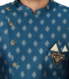 Teal green anghrakha pattern work with fawn pipe in indo western