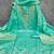 Elegant green woven zari unstitched salwar suit with dupatta