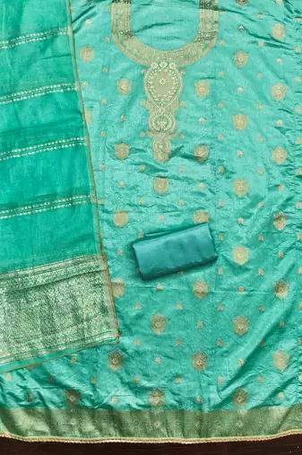 Elegant green woven zari unstitched salwar suit with dupatta