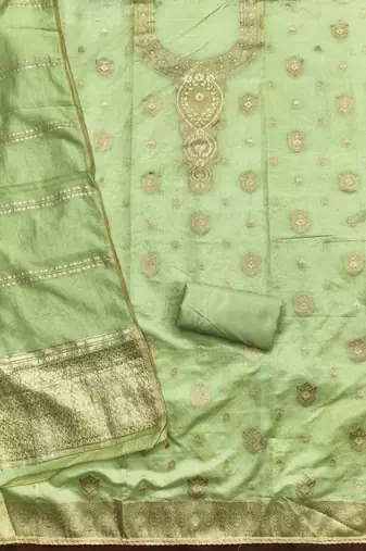 Elegant light green woven zari unstitched salwar suit with dupatta