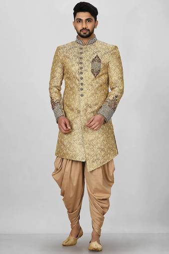 Gold straight pattern work on zari jamewar fabric with hand work on collar ,hand and front indo western