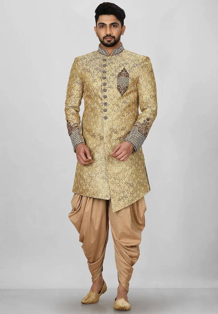 Gold straight pattern work on zari jamewar fabric with hand work on collar ,hand and front indo western
