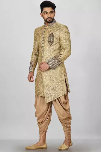 Gold straight pattern work on zari jamewar fabric with hand work on collar ,hand and front indo western