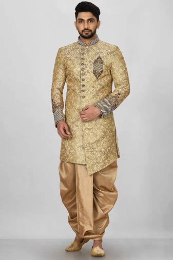 Gold straight pattern work on zari jamewar fabric with hand work on collar ,hand and front indo western