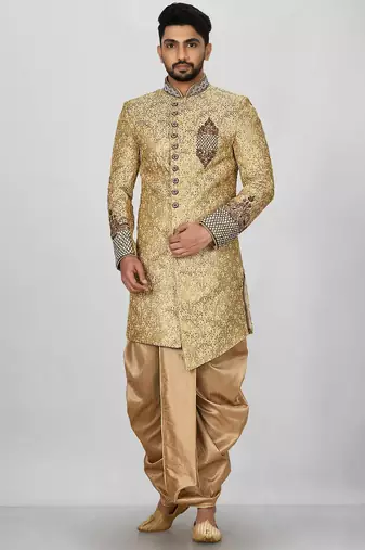 Gold straight pattern work on zari jamewar fabric with hand work on collar ,hand and front indo western