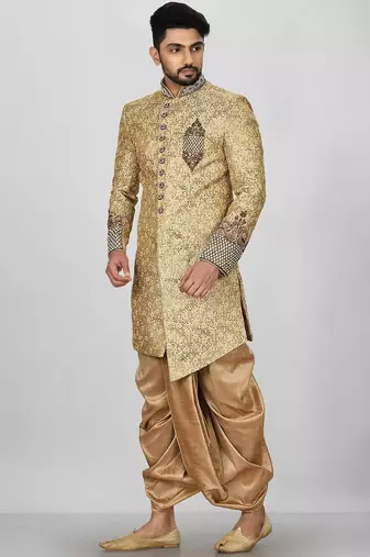 Gold straight pattern work on zari jamewar fabric with hand work on collar ,hand and front indo western
