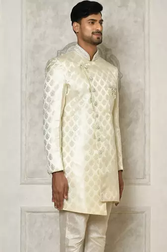 Ivory dupion arts silk anghrakha design with hand work on collar and buttons indo western