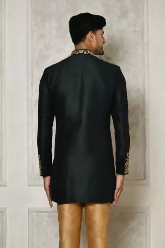 Bottle green dupion arts silk anghrakha design with hand work on collar and buttons indo western