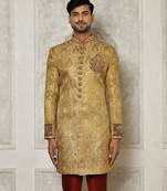 Gold straight pattern work on zari jamewar fabric with hand work on collar ,hand and front indo western