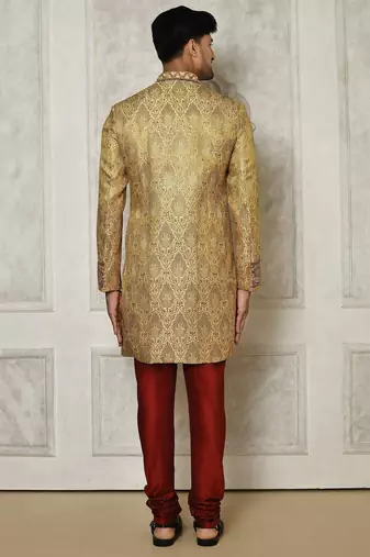 Gold straight pattern work on zari jamewar fabric with hand work on collar ,hand and front indo western