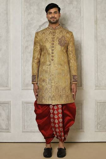 Gold straight pattern work on zari jamewar fabric with hand work on collar ,hand and front indo western