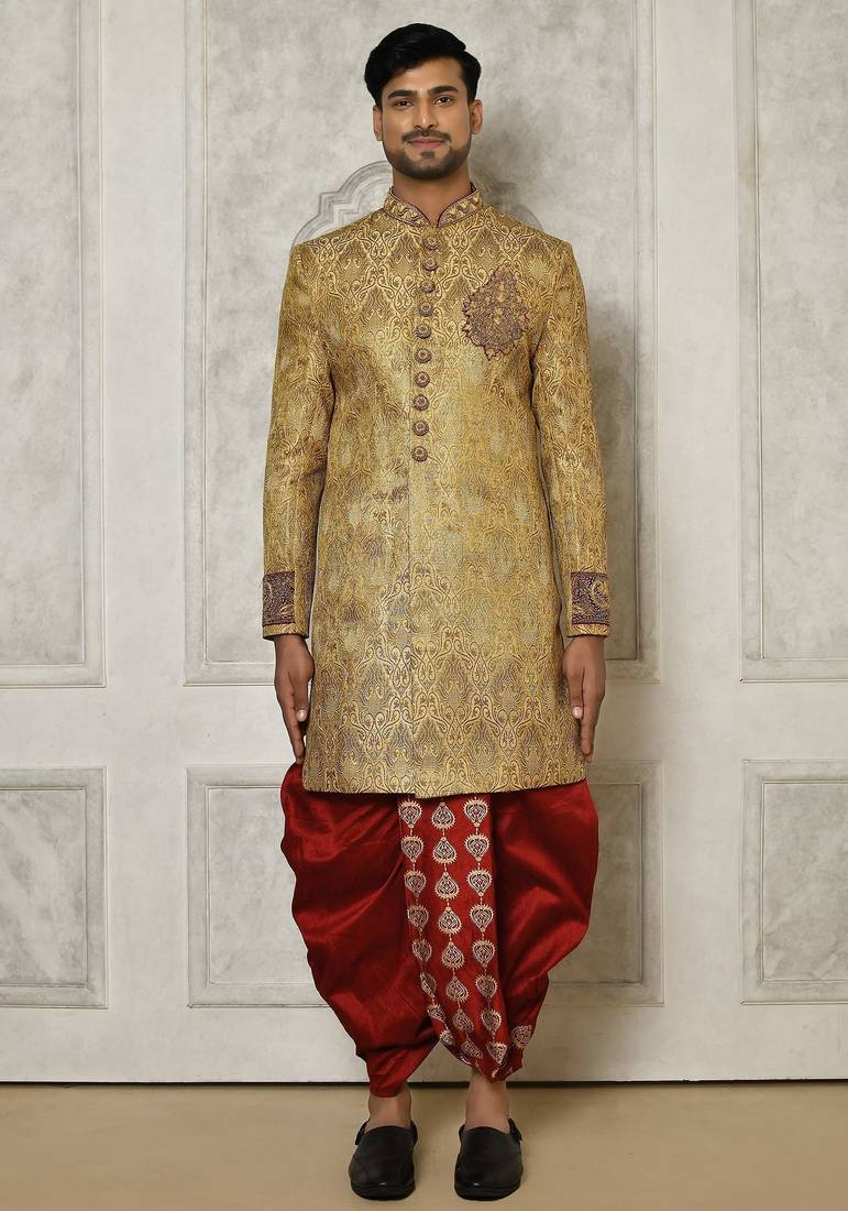 Gold straight pattern work on zari jamewar fabric with hand work on collar ,hand and front indo western