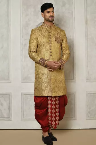Gold straight pattern work on zari jamewar fabric with hand work on collar ,hand and front indo western