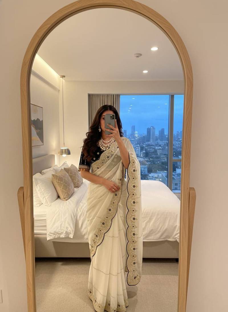 White Color embroidery sequence work Sattin Saree