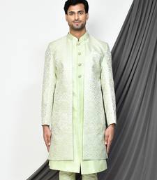 Sea green front open pattern design with detached inside sleeveless jacket indo western