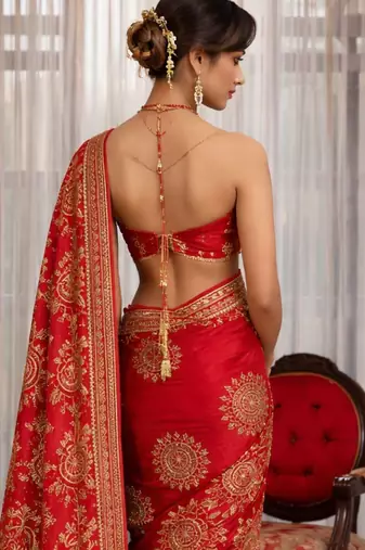 Red silk saree with gota patti jaal work, peacock motifs & heavy pallu