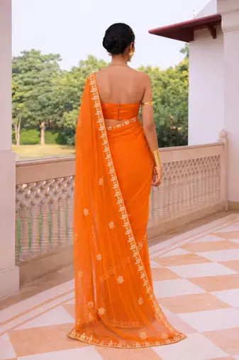 Orange chiffon saree with gotta patti & kardana work scallop border