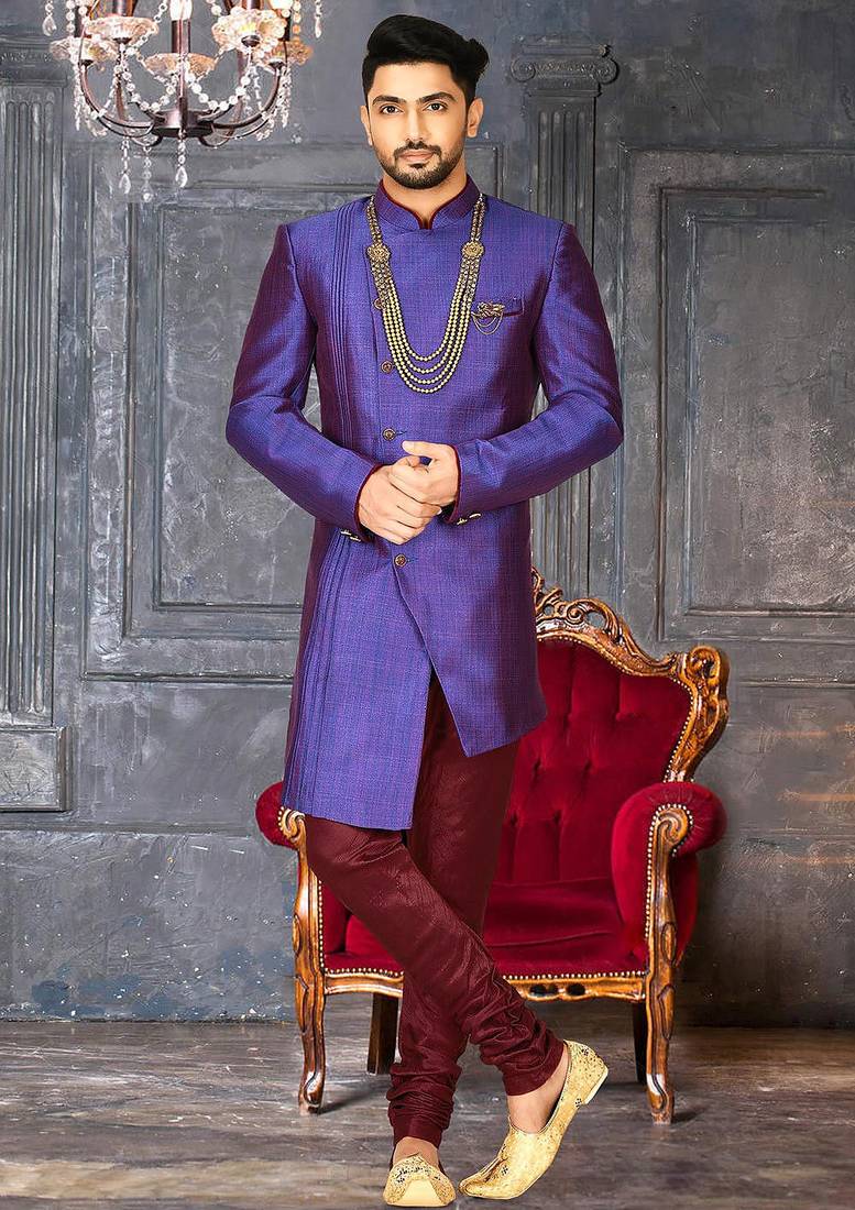 Royal blue anghrakha pattern work with mahroon pipe in indo western