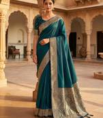 Teal soft banarasi silk fabric saree with natural zari weaving in gala border