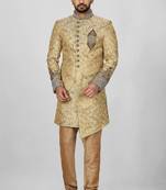 Gold straight pattern work on zari jamewar fabric with hand work on collar ,hand and front indo western