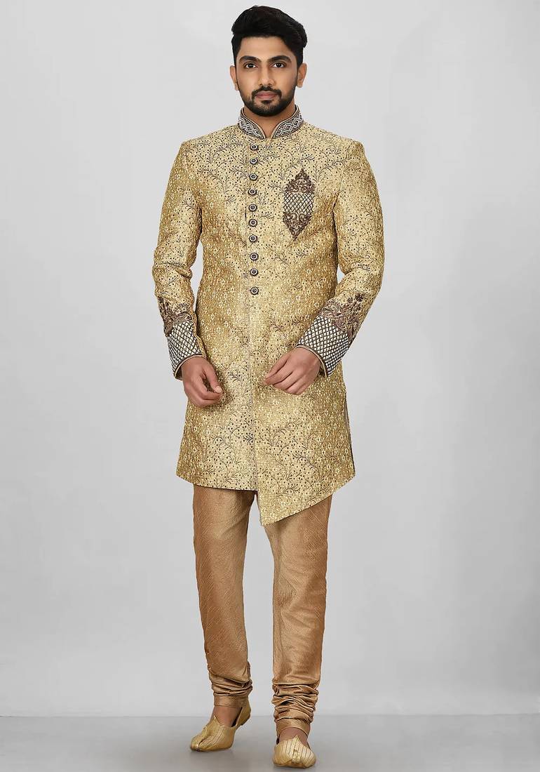Gold straight pattern work on zari jamewar fabric with hand work on collar ,hand and front indo western