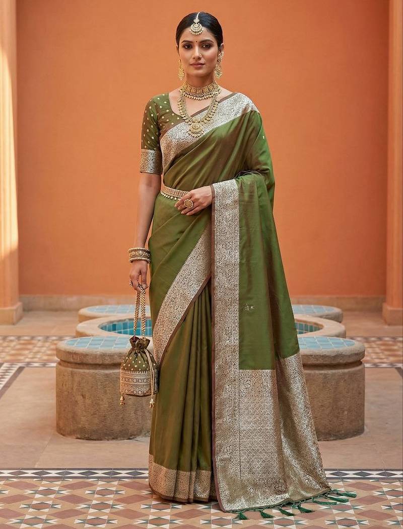 Green soft banarasi silk fabric saree with natural zari weaving in gala border