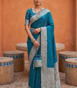 Teal soft banarasi silk fabric saree with natural zari weaving in gala border