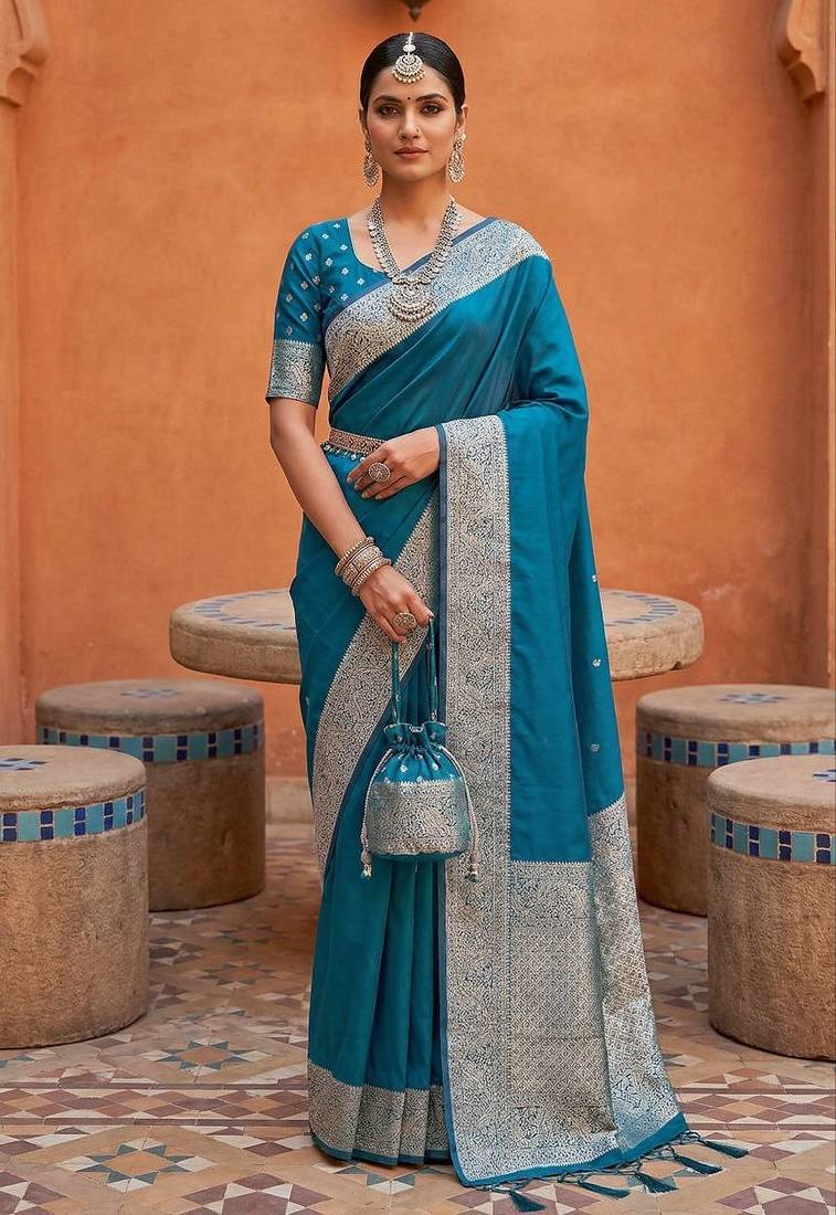 Teal soft banarasi silk fabric saree with natural zari weaving in gala border