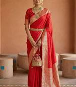 Red soft banarasi silk fabric saree with natural zari weaving in gala border