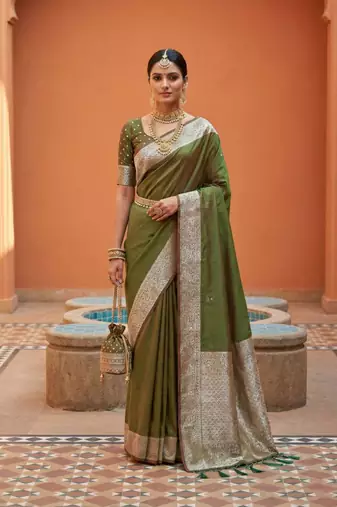 Green soft banarasi silk fabric saree with natural zari weaving in gala border