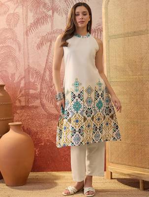 Women cream cotton printed kurta 1