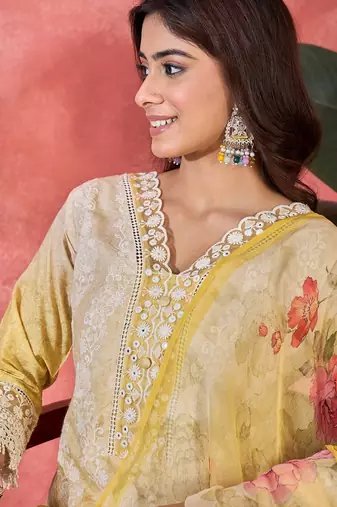 Women yellow pure cotton embroidered kurta set