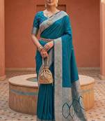 Teal soft banarasi silk fabric saree with natural zari weaving in gala border