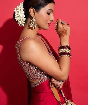 Women red embroidered rangoli silk blend saree 4